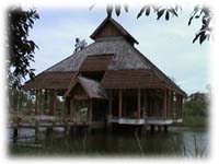 [Photograph of the office - set in the middel of a lake.]