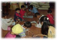 [Another photograph of children from Moo Baan Dek School.]